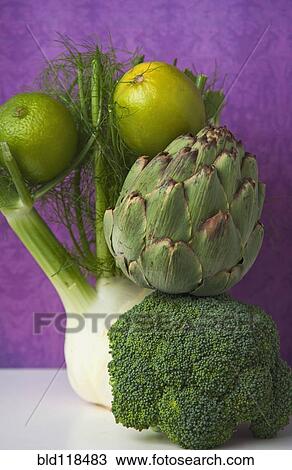 A fennel bulb, limes, an artichoke, and a head of broccoli View Large Photo Image Stock Image - A fennel bulb, limes, an artichoke, and a head of broccoli. Fotosearch