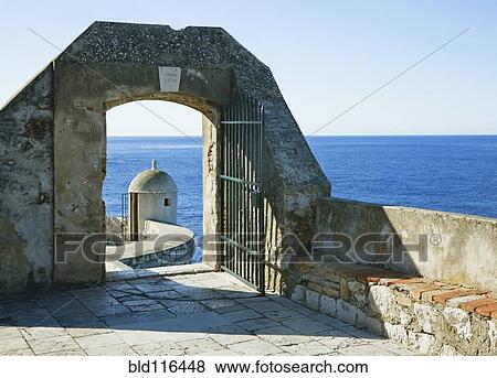 Stock Photo - A gate leading to another portion of the old wall surrounding the city of Dubrovnik, Croatia. Fotosearch