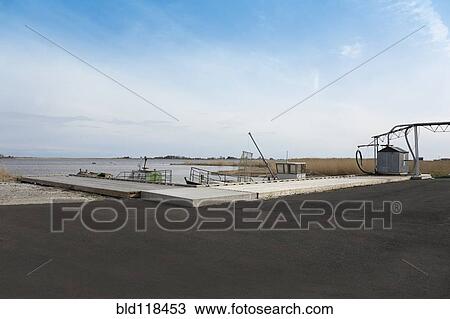 Stock Image - A large marina for fishermen and for their small boats. Fotosearch