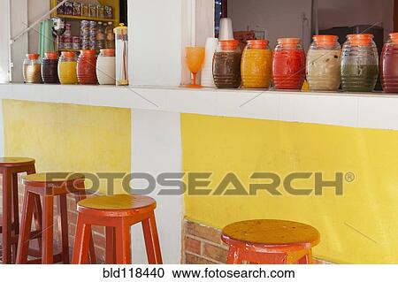 Stock Image - A market stall and drinks stand. Fotosearch