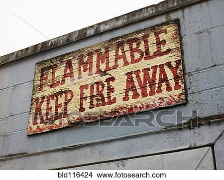 A painted warning sign, on the exterior of a building View Large Photo Image Picture - A painted warning sign, on the exterior of a building. Fotosearch