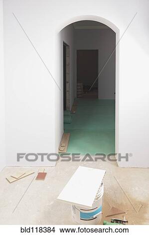 A room with partly installed laminate flooring View Large Photo Image Picture - A room with partly installed laminate flooring. Fotosearch