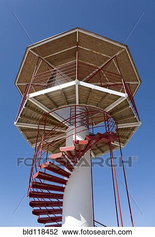 Stock Image - A tall watchtower with spiral staircase. Fotosearch