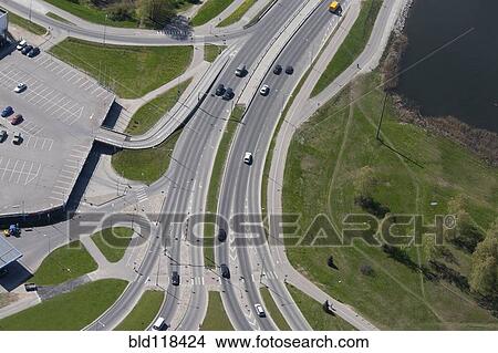 A view from the air over a major dual carriage road, with on and off ramps View Large Photo Image Picture - A view from the air over a major dual carriage road, with on and off ramps. Fotosearch