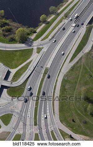 A view from the air over a major dual carriage road, with on and off ramps View Large Photo Image Stock Photography - A view from the air over a major dual carriage road, with on and off ramps. Fotosearch