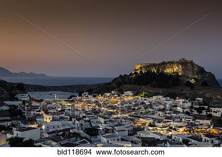 A view over the town and whitewashed houses of Lindos View Large Photo Image Picture - A view over the town and whitewashed houses of Lindos. Fotosearch