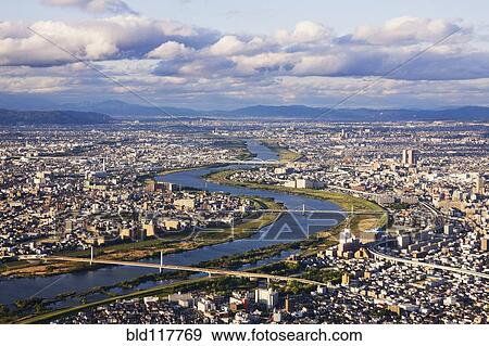 Stock Photo - Aerial Japanese Cityscape and River. Fotosearch