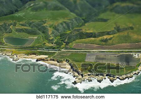 Stock Photography - Aerial View of a Coastal Road. Fotosearch