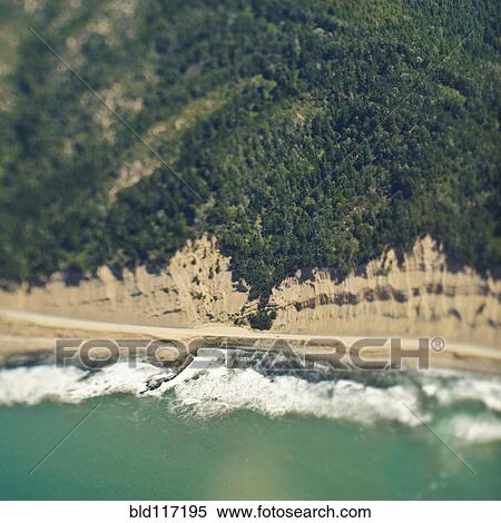 Stock Photography - Aerial View of a Coastal Road. Fotosearch
