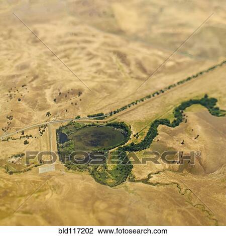Stock Image - Aerial View of a Lake in a Rural Setting. Fotosearch