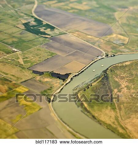 Aerial View of a River Passing Through Farmland View Large Photo Image Stock Image - Aerial View of a River Passing Through Farmland. Fotosearch