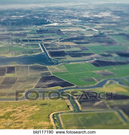 Aerial View of a River Passing Through Farmland View Large Photo Image Stock Image - Aerial View of a River Passing Through Farmland. Fotosearch
