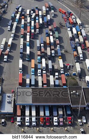 Aerial View of Semi Trucks At Port View Large Photo Image Picture - Aerial View of Semi Trucks At Port. Fotosearch