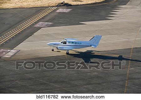 Airplane on a Runway View Large Photo Image Stock Image - Airplane on a Runway. Fotosearch