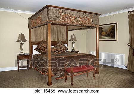 An antique style four poster bed with drapes and curtains View Large Photo Image Stock Photography - An antique style four poster bed with drapes and curtains. Fotosearch
