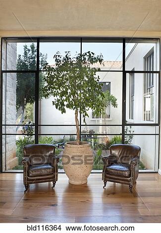 Picture - Armchairs in Front of a Large Window. Fotosearch