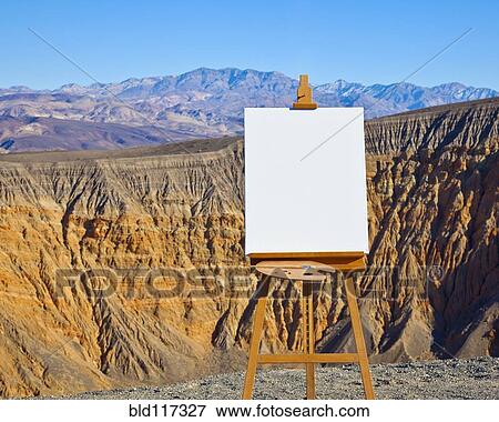 Stock Photo - Artist's Easel and Canvas in Desert. Fotosearch