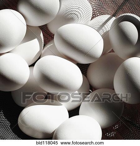 Stock Photography - Basket of Fresh Eggs. Fotosearch