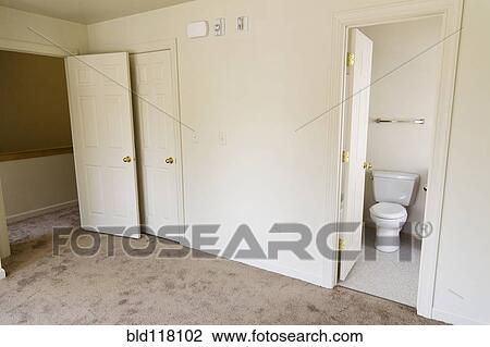 Stock Image - Bathroom Off Of Bedroom. Fotosearch