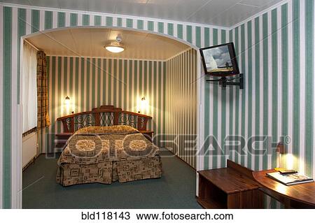 Stock Image - Bed In Hotel Room. Fotosearch