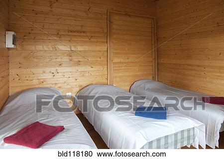 Stock Image - Beds at a Holiday Resort. Fotosearch