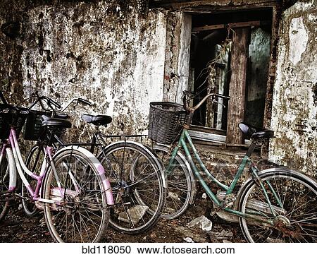Bicycles Parked Along an Old Wall View Large Photo Image Stock Image - Bicycles Parked Along an Old Wall. Fotosearch