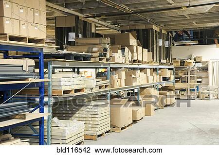 Stock Image - Boxes and Other Materials in Warehouse. Fotosearch