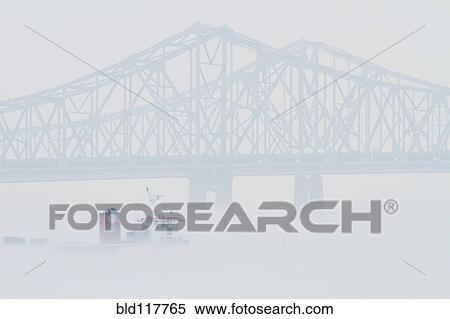 Stock Photography - Bridge and Boat in Fog. Fotosearch