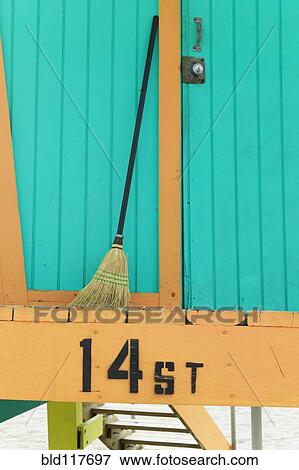 Stock Photo - Broom Standing at Back of Lifeguard Station. Fotosearch