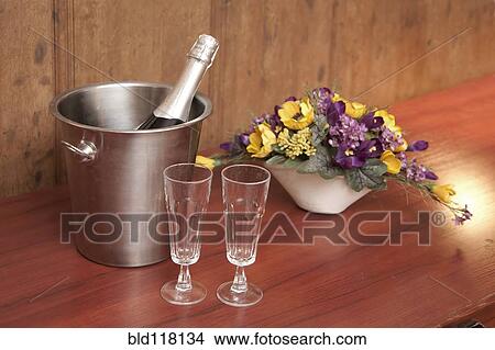 Picture - Bucket With Champagne and Two Glasses. Fotosearch