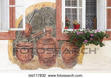 Stock Image - Building Mural and Flower Box. Fotosearch