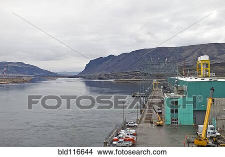 Picture - Cars Parked on a Hydroelectric Dam. Fotosearch