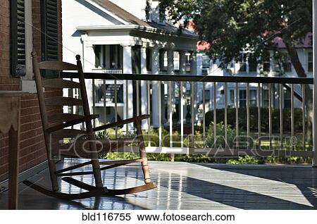 Stock Photography - Chair on Front Porch. Fotosearch
