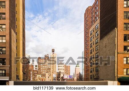 Cityscape Seen Between Buildings View Large Photo Image Stock Photo - Cityscape Seen Between Buildings. Fotosearch