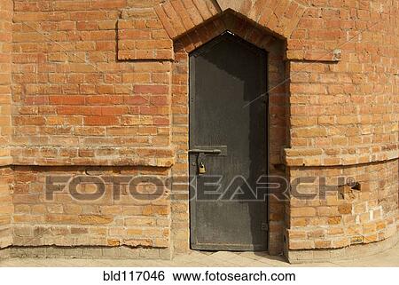 Stock Photograph - Closed and Padlocked Wooden Door. Fotosearch