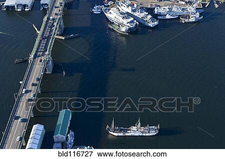 Stock Photo - Commercial Boats Near Ballard Bridge. Fotosearch