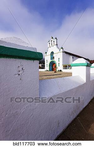 Stock Image - Concrete Wall and Church. Fotosearch