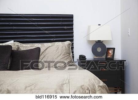 Contemporary Bed and Nightstand View Large Photo Image Stock Photography - Contemporary Bed and Nightstand. Fotosearch