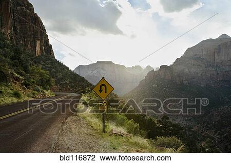 Curve Ahead Sign in Mountain Pass View Large Photo Image Stock Image - Curve Ahead Sign in Mountain Pass. Fotosearch