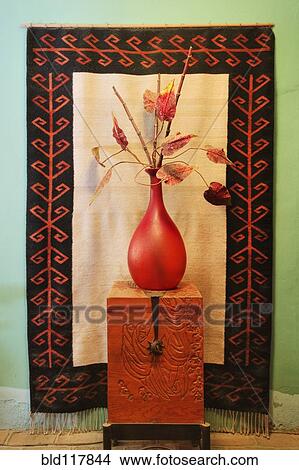 Picture - Decorative Vase on a Wooden Chest. Fotosearch