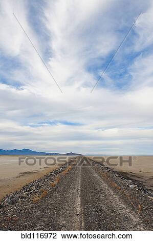 Stock Image - Dirt Road in Desert. Fotosearch