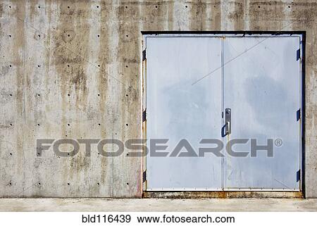 Double doors of a warehouse or storage unit View Large Photo Image Stock Photo - Double doors of a warehouse or storage unit. Fotosearch