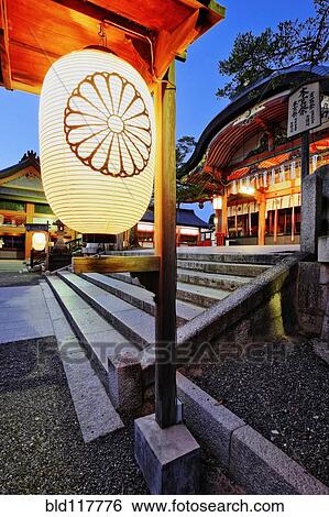Stock Photograph - Dusk Scene at Inari Shrine. Fotosearch