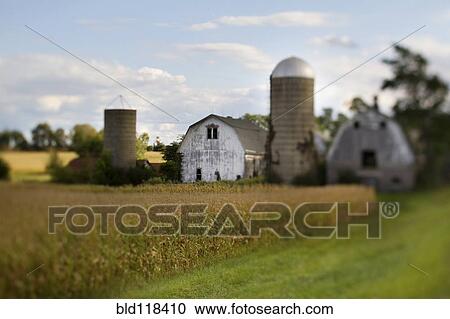 Dutch barn and grain silo or tower View Large Photo Image Stock Image - Dutch barn and grain silo or tower. Fotosearch