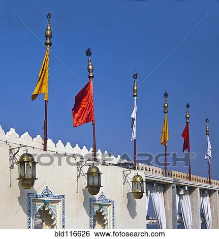 Stock Photograph - Flags at Jag Mandir Palace. Fotosearch