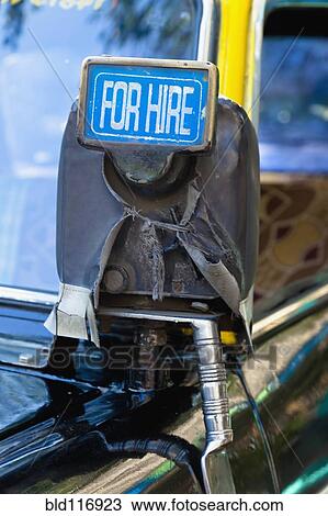 Stock Image - For Hire Sign on Taxi. Fotosearch