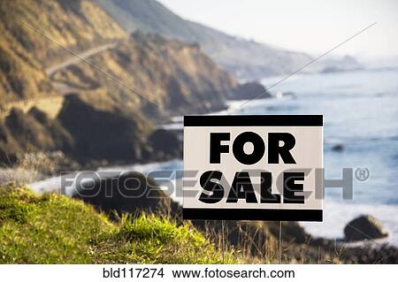 Picture - For Sale Sign Along Coast. Fotosearch