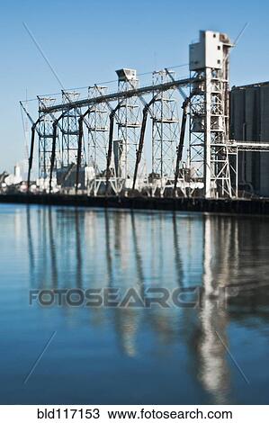 Stock Image - Grain Transfer Facility at a Seaport. Fotosearch