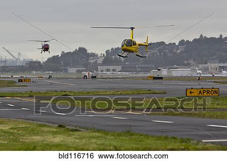 Helicopters Landing on a Runway View Large Photo Image Stock Photograph - Helicopters Landing on a Runway. Fotosearch