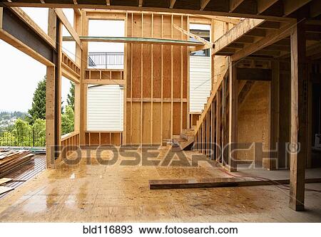 Stock Image - Home under construction. Fotosearch